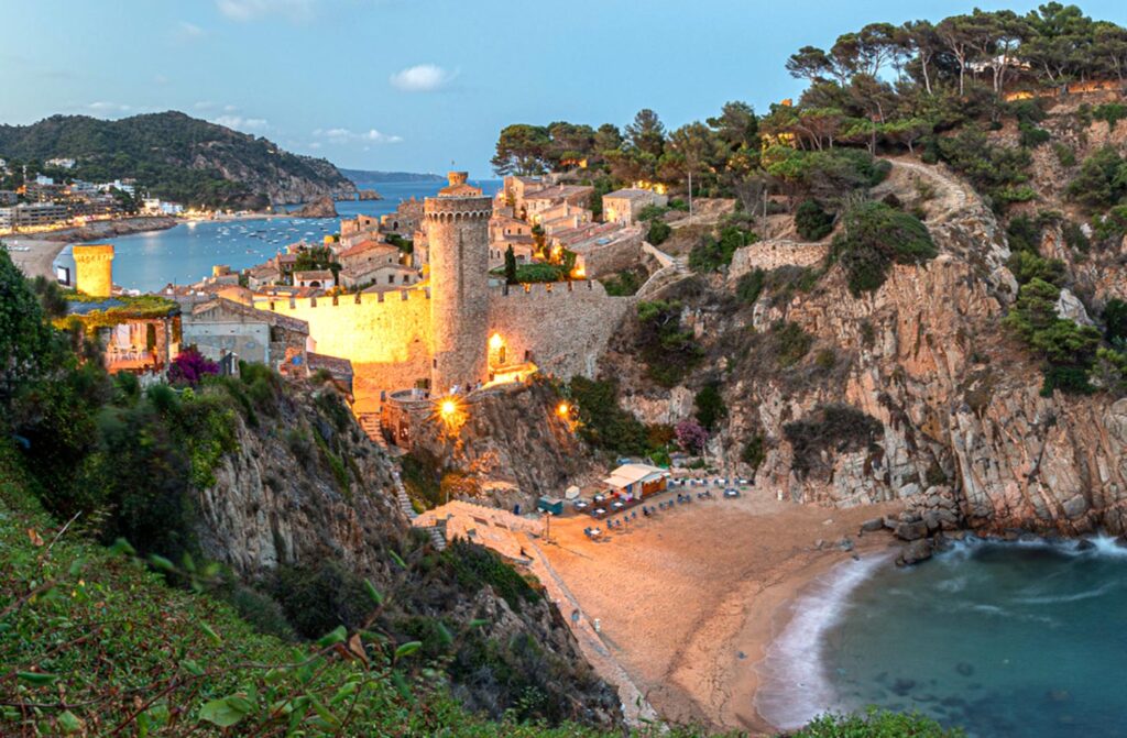 Cala Pola cove with clear turquoise water near Tossa de Mar, Girona