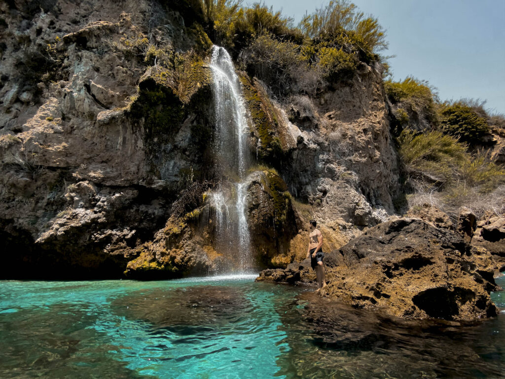 Playa de Maro beach and cliffs within the Acantilados de Maro-Cerro Gordo natural park, Nerja