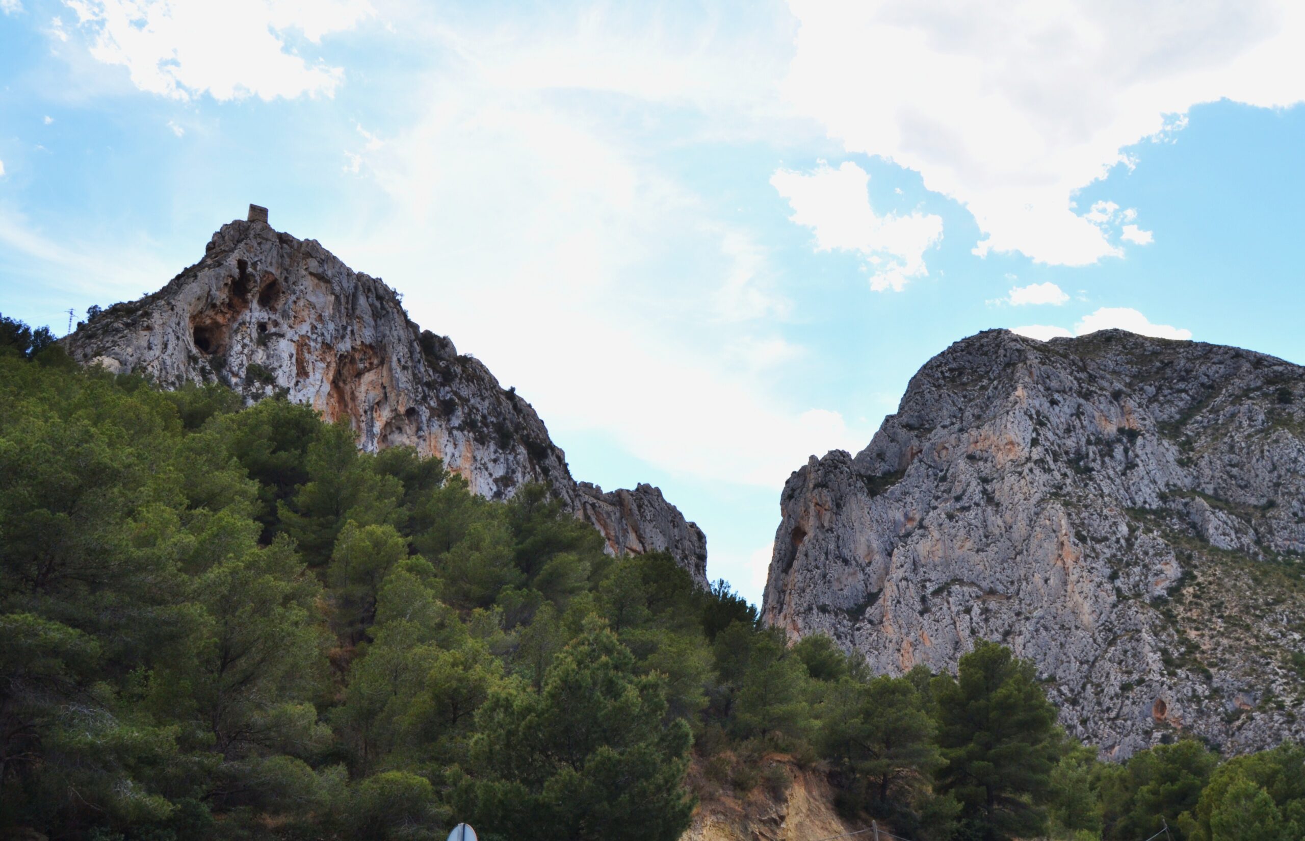 The ruined Castell del Mascarat seen from the road between Altea and Calpe
