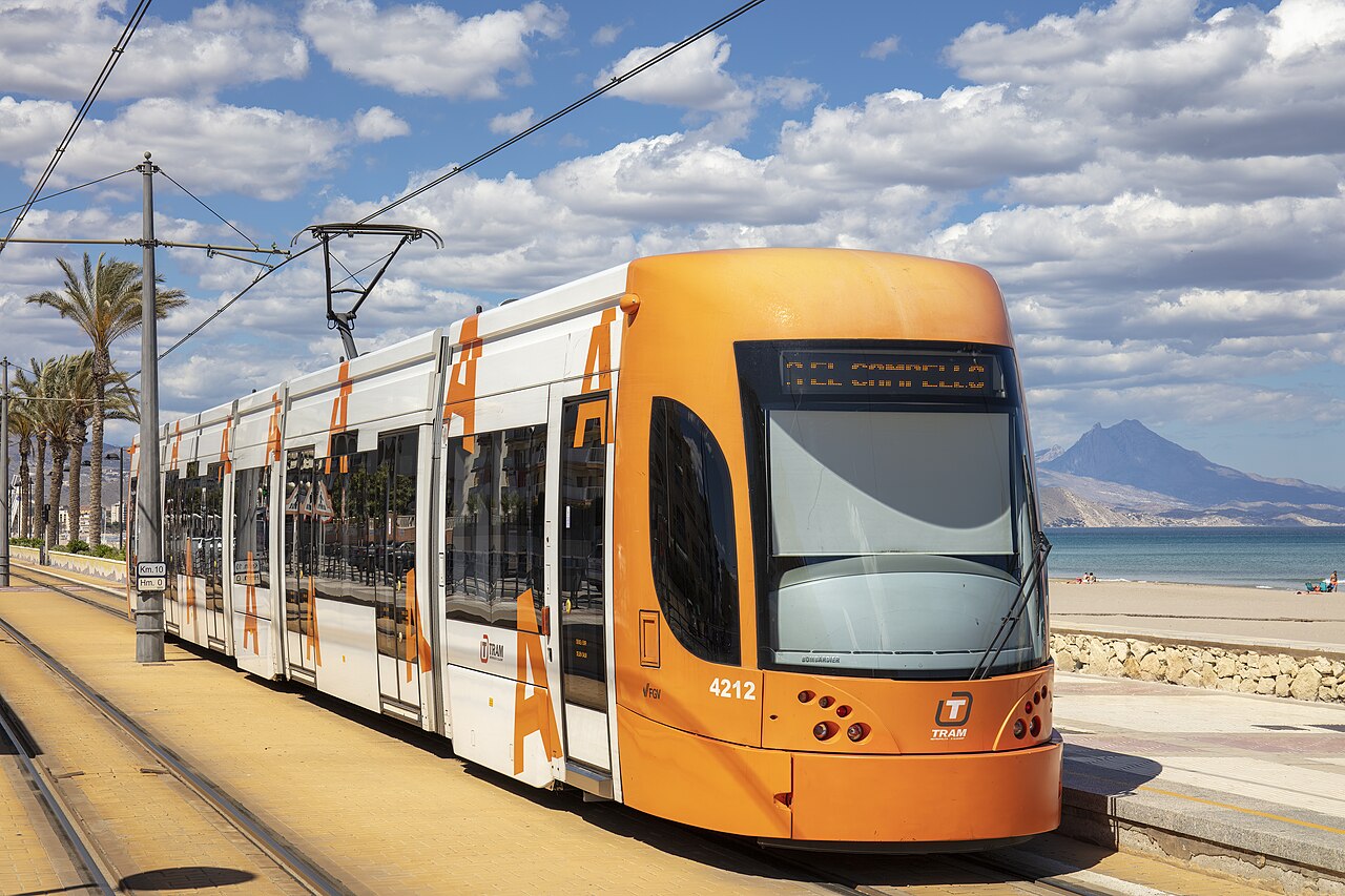 The Alicante tram running alongside Playa de San Juan